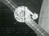 Pohled ze Sojuzu TM-31 na ISS přes připojením (02.11.2000)