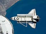 Raketopln Discovery STS-133 pi odletu od stanice ISS (07.03.2011)