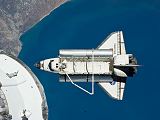 Raketoplán Discovery STS-133 při odletu od stanice ISS (07.03.2011)